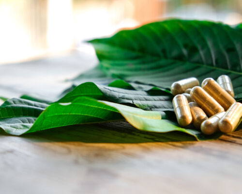 capsules on kratom leaf